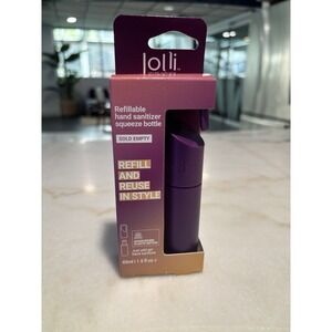 Brand new in box Jolli Refillable Hand Sanitizer Squeeze Bottle in purple